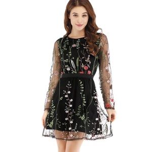 Sheer floral and black high neck dress
